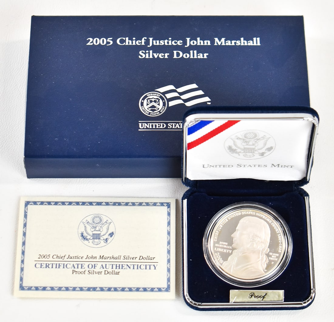 2005 UNITED STATES MINT CHIEF JUSTICE JOHN MARSHALL UNCIRCULATED SILVER DOLLAR: A 2005 United States Mint Chief Justice John Marshall uncirculated silver dollar. This coin has a weight of 26.73 grams and a composition of 90% silver. The lot measures 1" H x 6" W x 3.5" D. Comes wi