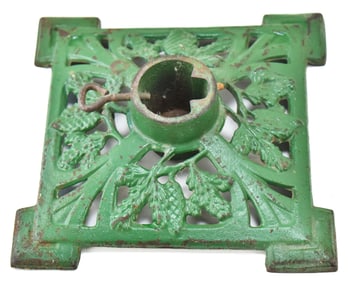 GERMAN CAST IRON CHRISTMAS TREE STAND FEATURING FOLIAGE; EARLY 1900s