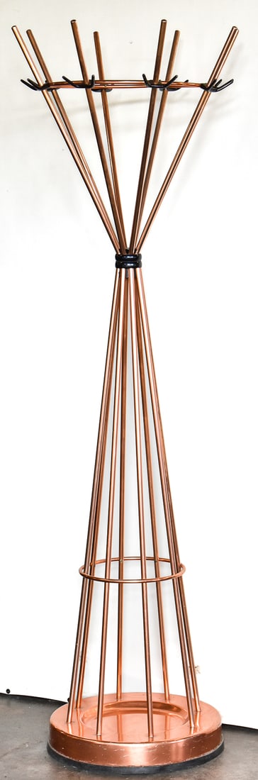 MCM ITALIAN DESIGN ROTATING COAT RACK: A circa 1960s-70s MCM Italian design tubular metal with copper finish coat rack with rotating top section, measuring 73" H x 24" W x 24" D.