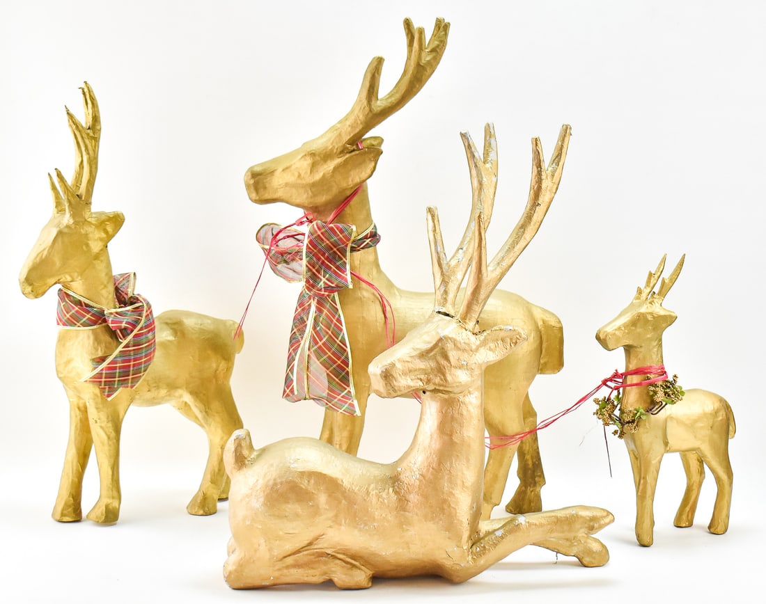 FOUR PAPER MACHE DECORATIVE REINDEER