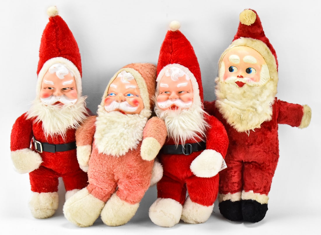 FOUR VINTAGE SANTA CLAUS PLUSHES: Four vintage Santa Claus plush toys includes two BJ Toys plushes, a Genie plush, and an unmarked Santa plush toy, all with rubber or plastic faces. The largest measures 11" H x 11" W x 4" D.
