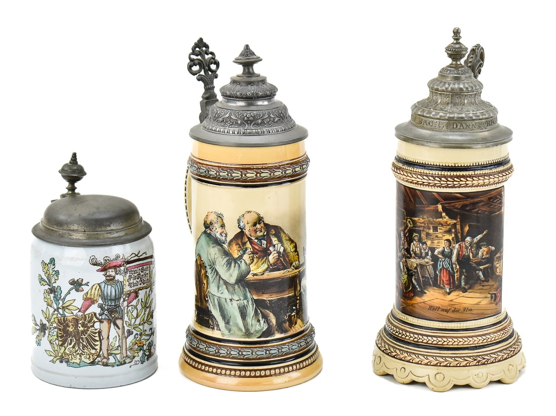 ANTIQUE PICTORIAL STONEWARE STEINS IN 1/2 L: METTLACH #1526/661 & MORE: This lot includes several antique pictorial stoneware steins in 1/2 L sizes with pewter lids, including: one Mettlach Villeroy & Boch "Flagbearer of Patriotism" #1526/661 with "Mit Gott für Kaiser un