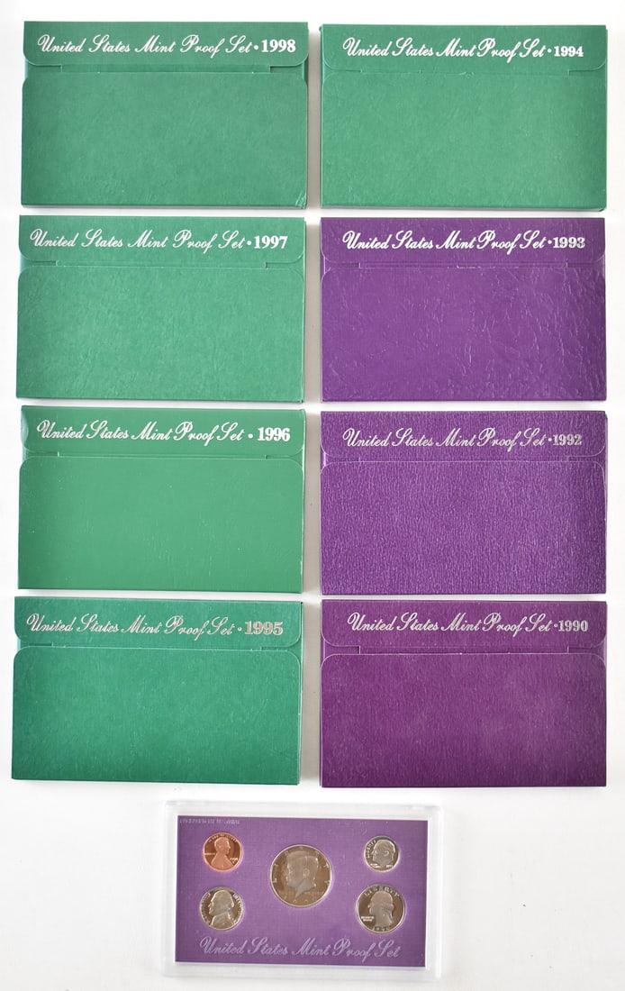 8 U.S. PROOF SETS FROM THE 1990s: An assortment of eight U.S. proof sets from the years 1990, 1992, 1993, 1994, 1995, 1996, 1997, and 1998. Each set comes in a hard plastic case and paper case measuring 3.5" H x 5.5" W x 0.4" D.