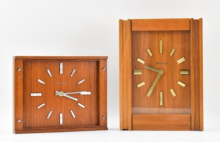 PAIR OF MID-CENTURY DUGENN WALL CLOCKS
