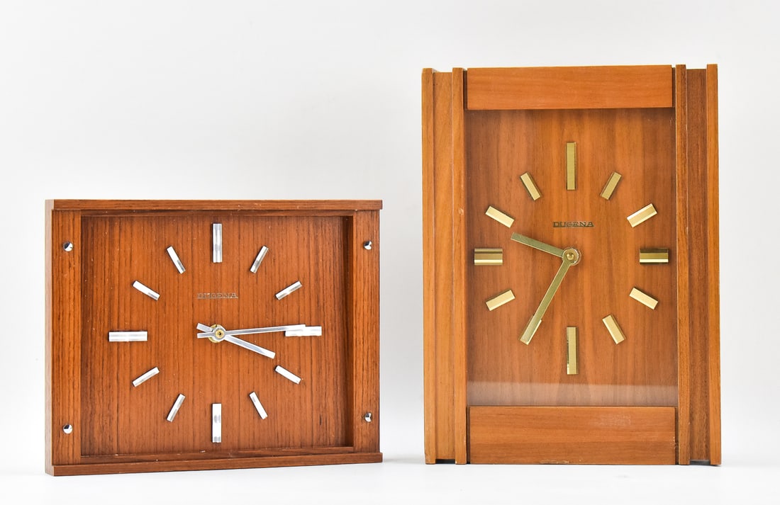 PAIR OF MID-CENTURY DUGENN WALL CLOCKS (1 of 3)