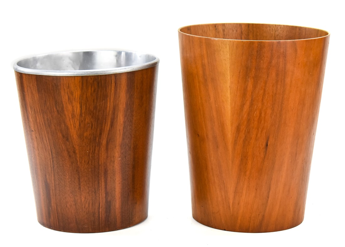 PAIR OF MID-CENTURY SERVEX OF SWEDEN RAINBOW TEAK WASTEBASKETS: Pair of mid-century Servex of Sweden rainbow teak wastebaskets designed by Martin Aberg. One has an aluminum interior and measures 11" H x 10" W x 10" D.