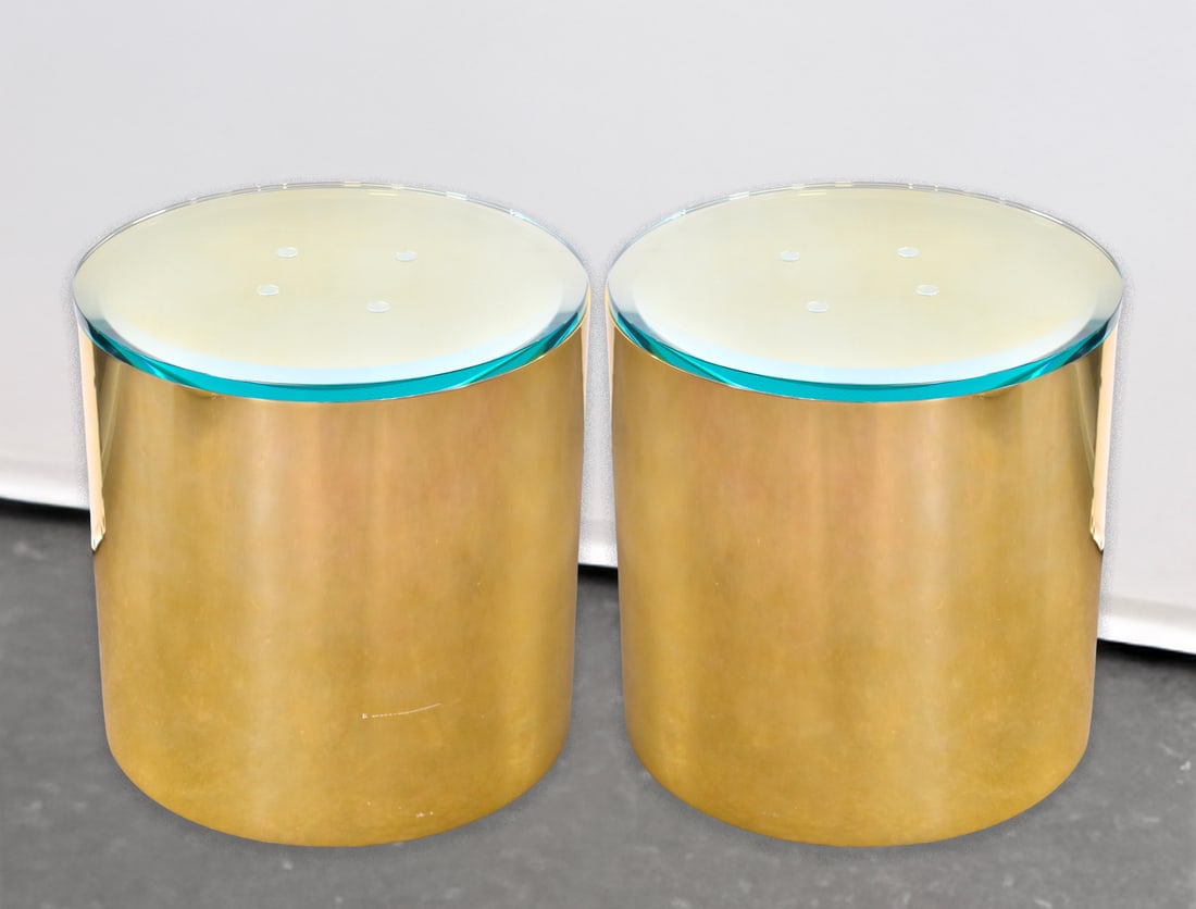 PAIR OF BRASS DRUM GLASS-TOP SIDE TABLES, PAUL MAYEN FOR HABITAT ARCHITECTURAL SUPPLEMENTS: A pair of brass drum glass-top side tables by Paul Mayen for Habitat Architectural Supplements, circa 1970s. Each drum with the top on measures 18.25" H x 18" W x 18" D.