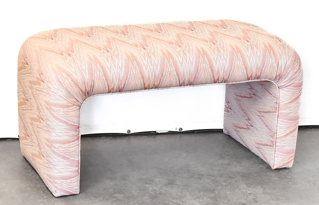 POSTMODERN CUSTOM UPHOLSTERED WATERFALL STYLE BENCH: A 1980-90s Postmodern custom upholstered waterfall style bench, measuring 18"H x 35"W x 19"D.