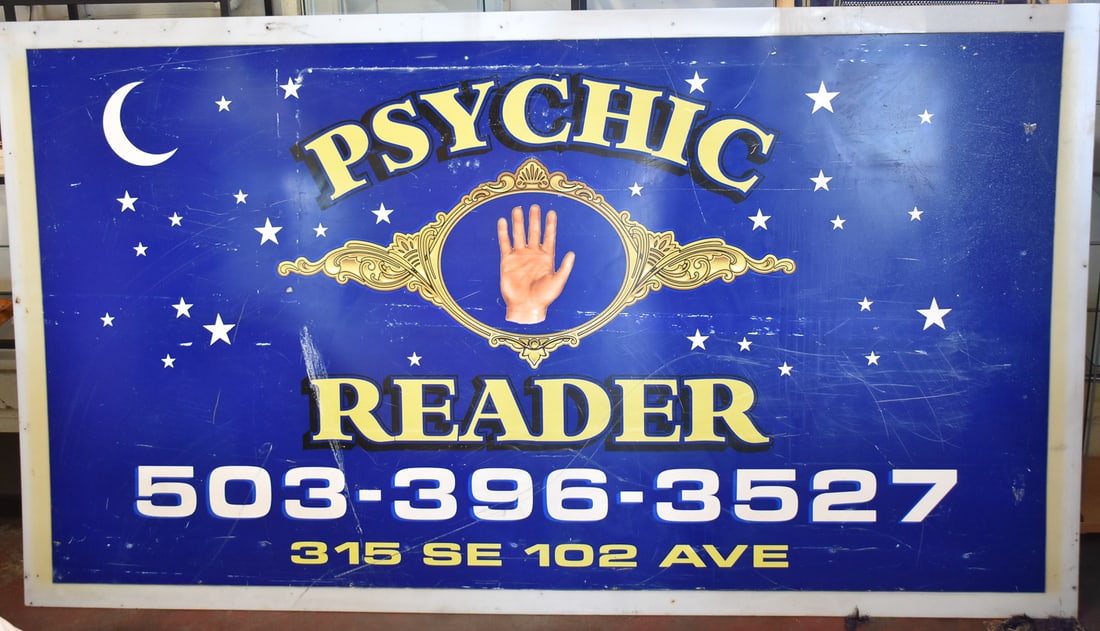 RACHEL LEE (OREGON) PSYCHIC ADVERTISEMENT SIGN: A psychic advertisement sign belonging to Rachel Lee, an infamous Canby, Oregon psychic convicted for fraud in 2015. The item measures 52.5" H, 94" W, 1" D.
