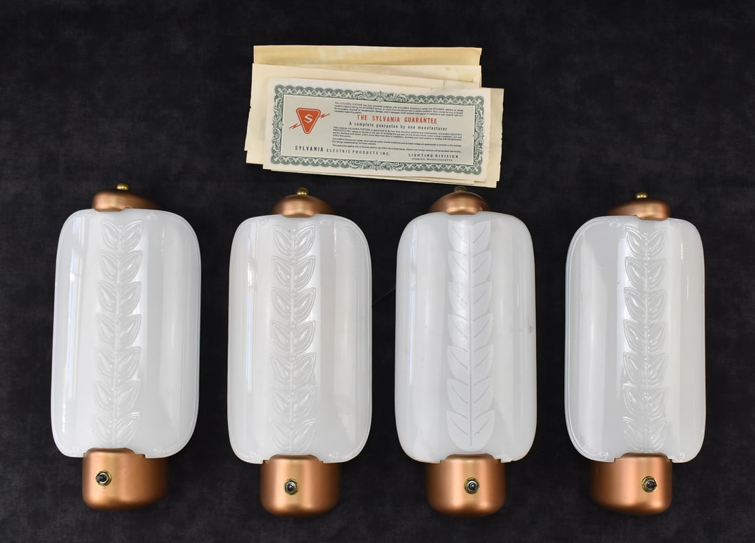 MID-CENTURY SYLVANIA RW-160 LIGHT FIXTURES: A set of four Mid-century Sylvania RW-160 light fixtures with the original certificates and manuals. Each fixture measures 11.5" H x 5.25" W x 3" D when assembled.