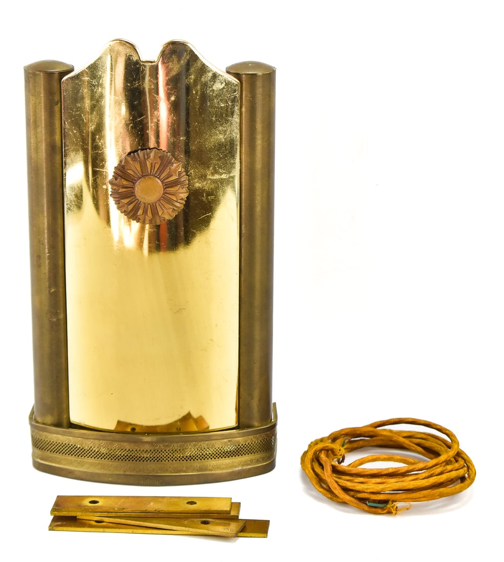 MID-CENTURY NUTONE DOOR CHIME: A Mid-century Nutone brass door chime #050747 measuring 14" H x 7.5" W x 3" D.