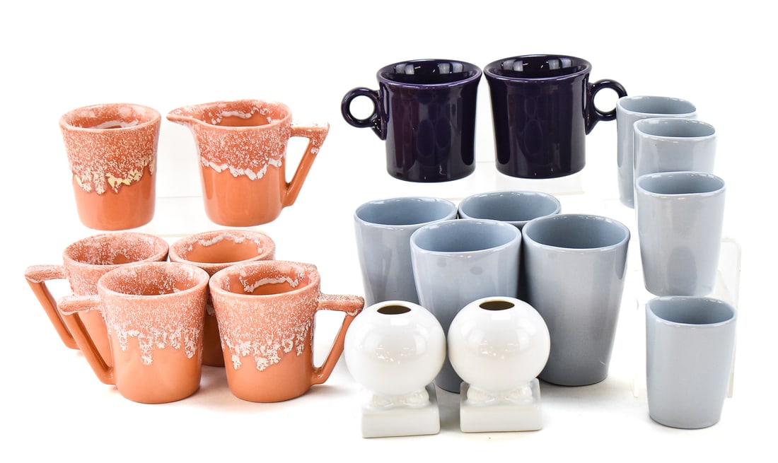 FRANKOMA POTTERY TUMBLERS, FIESTA MUGS & CANDLESTICKS, & WINART POTTERY: This lot includes the following: eight Frankoma Pottery "Country Blue" tumblers, two Fiesta purple mugs, Fiestaware candlesticks pair; and Winart Pottery pink four mugs, one creamer and sugar. The lar
