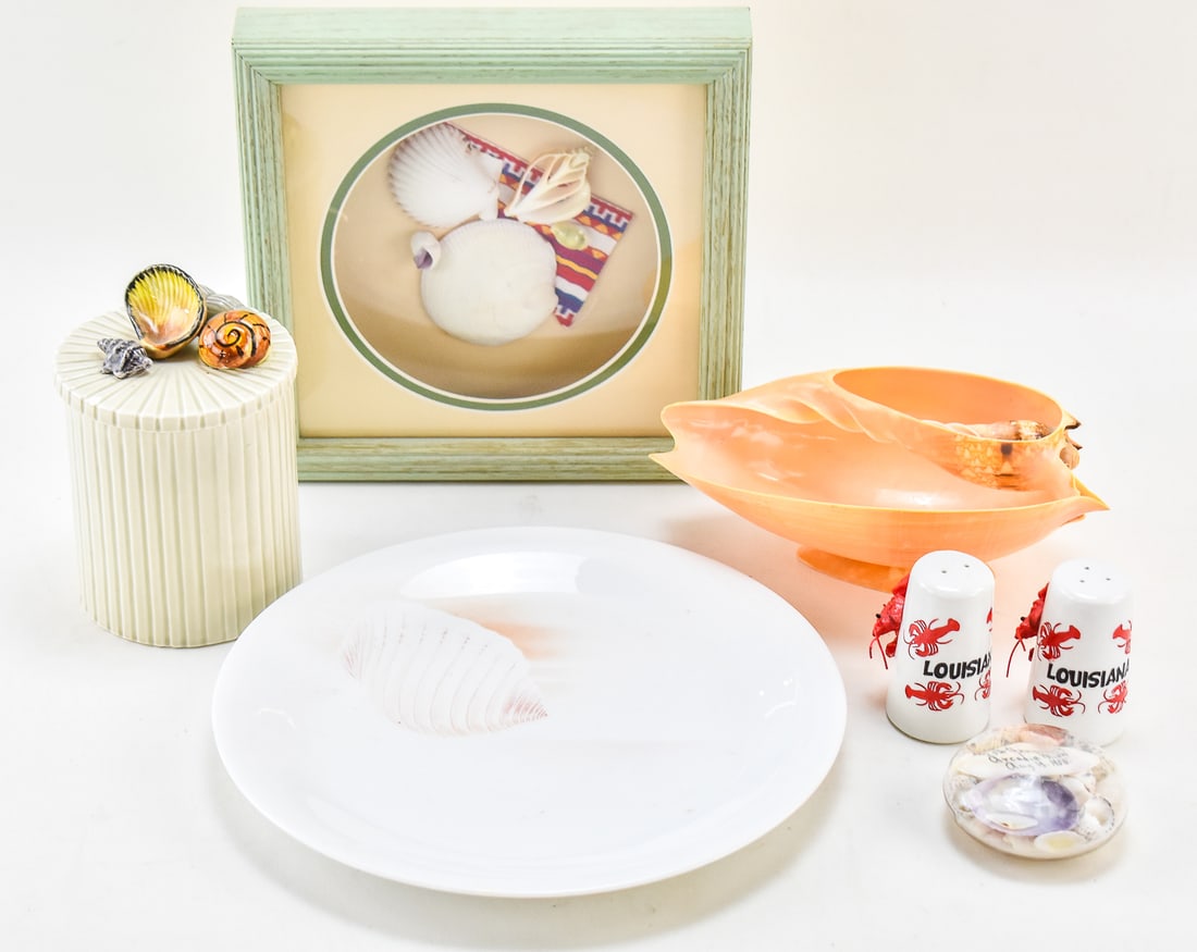 ASSORTED SHELL ART: NORITAKE, FITZ & FLOYD, SOUVENIRS, & MORE: This lot includes the following pieces featuring shell art: 1906 "25th anniversary" Arcadia, Michigan paperweight, Noritake "Sea Gems" plate, 1975 Fitz & Floyd ceramic canister, Louisiana lobster