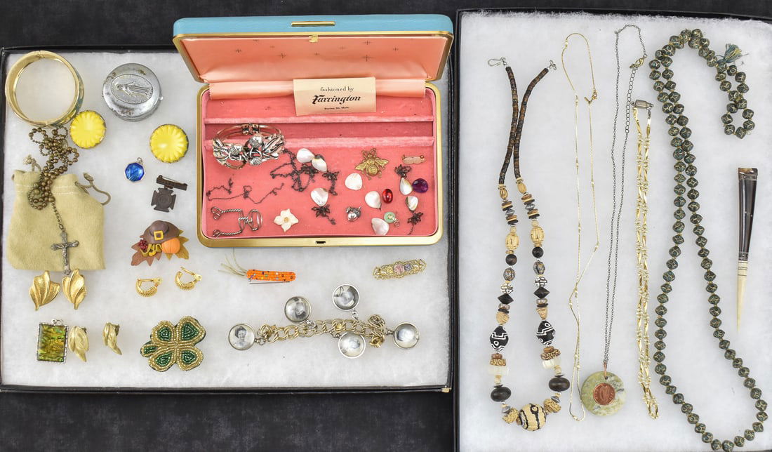 COLLECTION OF MID-CENTURY COSTUME JEWELRY & MORE: A collection of Mid-century costume jewelry and more, including beaded necklaces, a soapstone penny pendant, horn and bone letter opener, earrings, novelty pins, a crucifix necklace, a cloisonne
