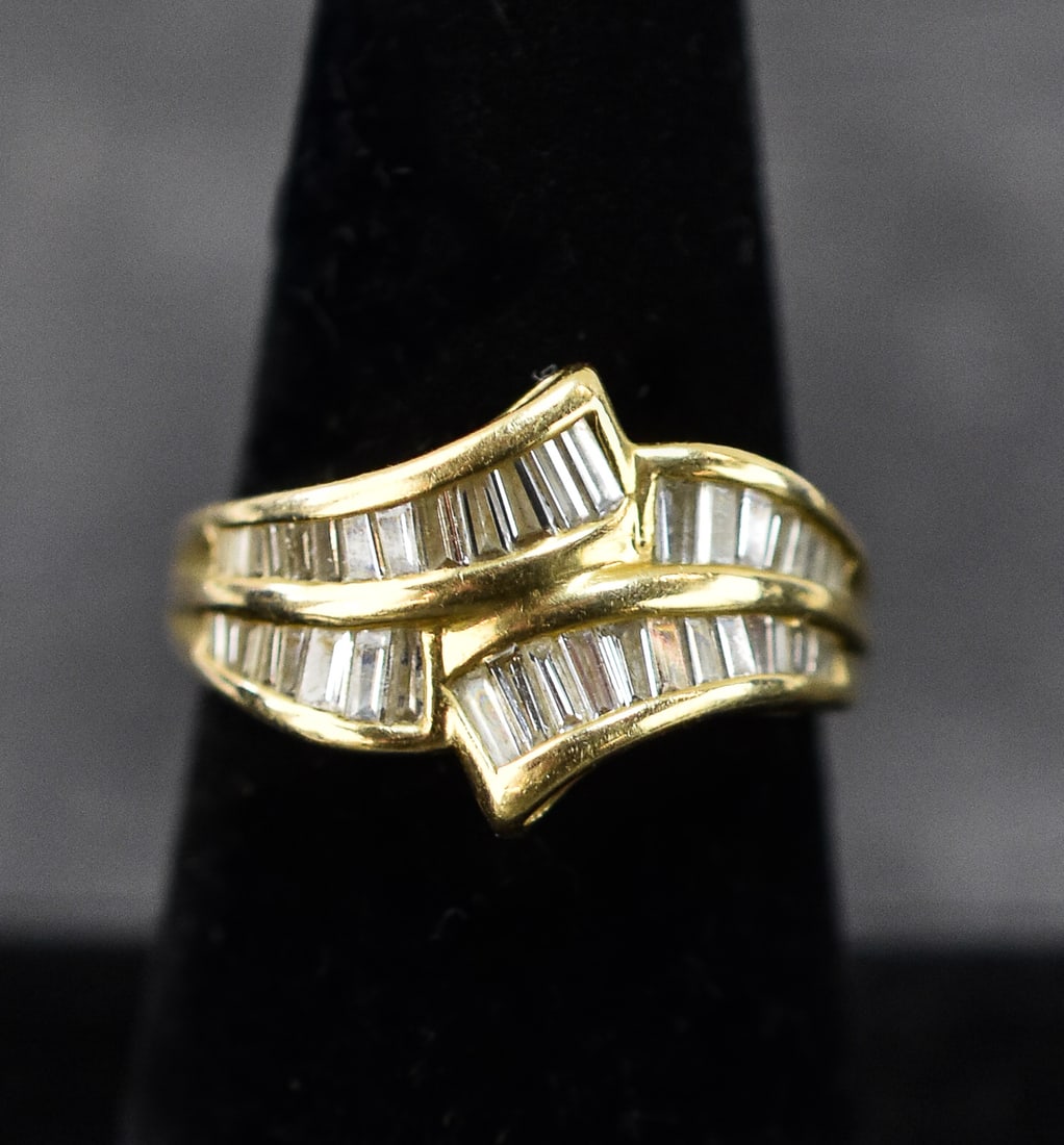 SIMON GOLUB & SONS 14K GOLD RING WITH BAGUETTE DIAMONDS: A Simon Golub & Sons 14K yellow gold ring with baguette diamonds. The diamonds have been professionally tested as authentic. The inside of the band is marked 14KT and SGS, the maker mark. The ring has