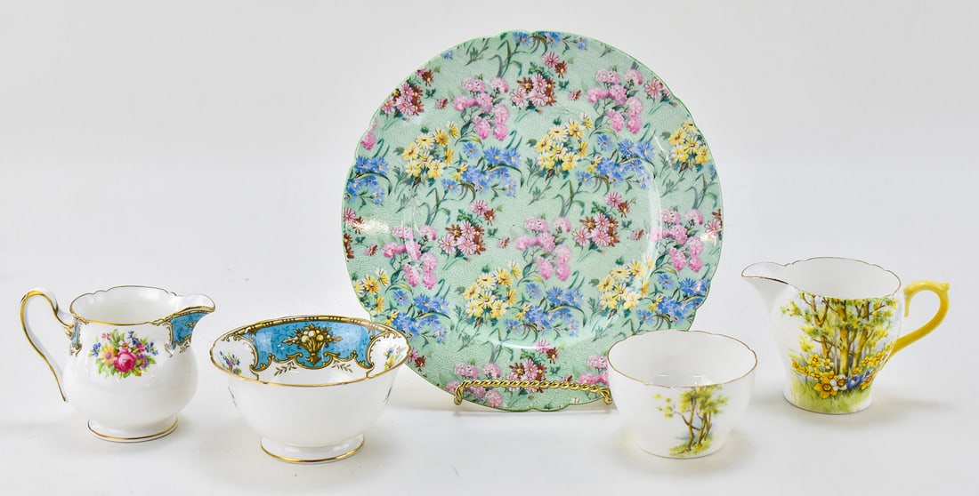 SHELLEY ENGLAND PORCELAIN ASSORTMENT: 'DAFFODIL TIME', 'DUCHESS', 'MELODY': A collection of Shelley England porcelain which includes; a "Daffodil Time" creamer and sugar set, "Duchess" creamer and sugar set, and a "Melody" luncheon plate measuring 8.5" H x 8.5" W x 0.5" D.