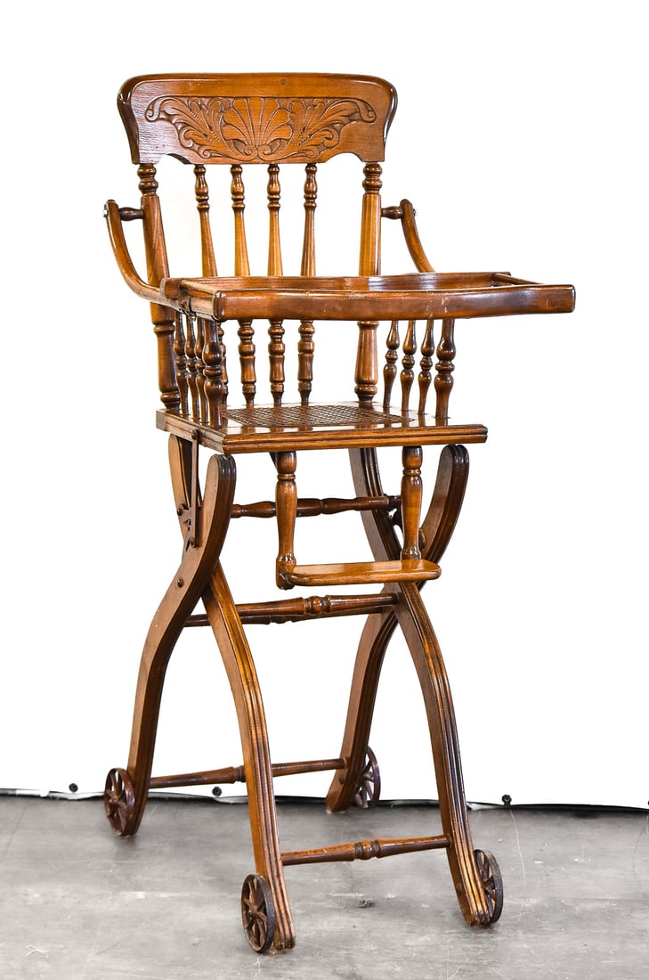 VICTORIAN ADJUSTABLE HEIGHT COMBINATION CHAIR: A Victorian adjustable height combination oak and cane chair with two height settings, circa late 19th century. The item measures 40.5" H, 18" W, 21.5" D.