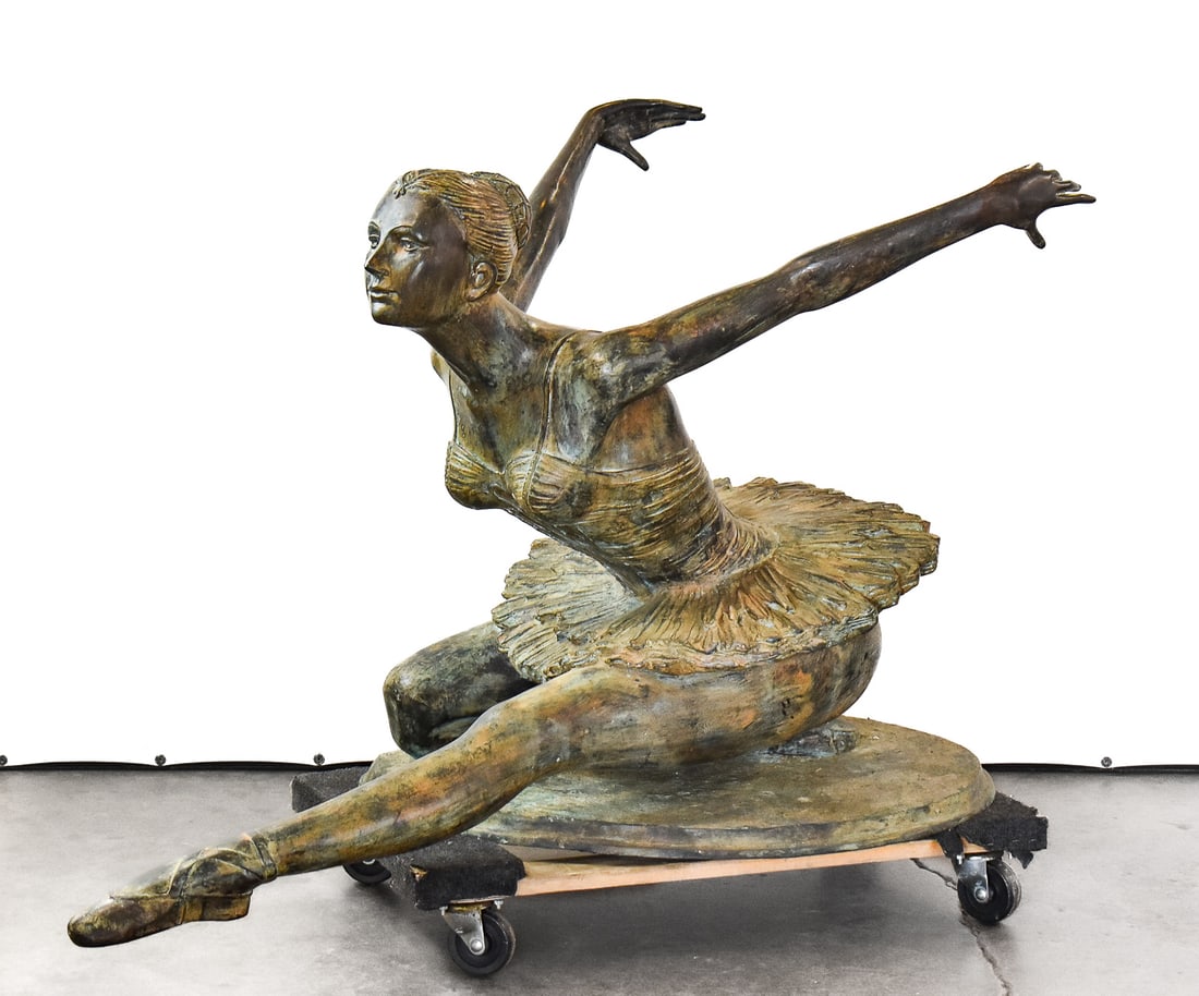 CONTEMPORARY CAST BRONZE BALLERINA FIGURAL COFFEE TABLE BASE: A contemporary patinated cast bronze ballerina figural coffee table base. The item measures 29.5" H, 28.5" W, 46.5" D.
