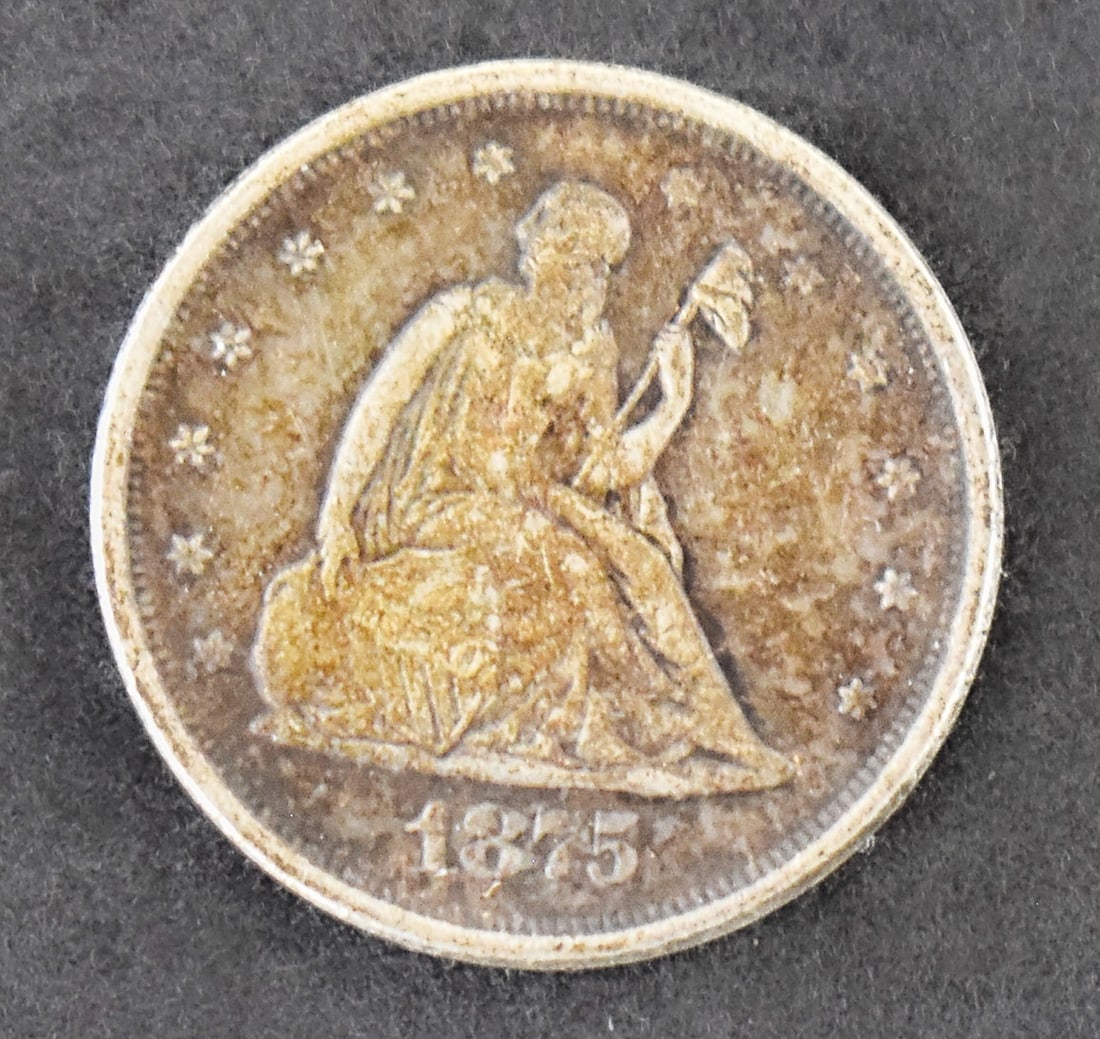 1875-S LIBERTY SEATED 20 CENT COIN: An 1875-S Liberty Seated 20 cent coin. The coin is struck in 90% silver with a weight of 5 grams.