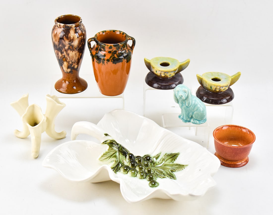 COLLECTION OF USA MADE POTTERY ROSEVILLE, HULL, MCCOY & MORE: A collection of vintage USA made pottery which includes; a set of Roseville Wincraft green candle holders, a Shawnee spaniel dog figure, a unmarked Franciscan El Patio sherbet bowl, a made in Japan iv