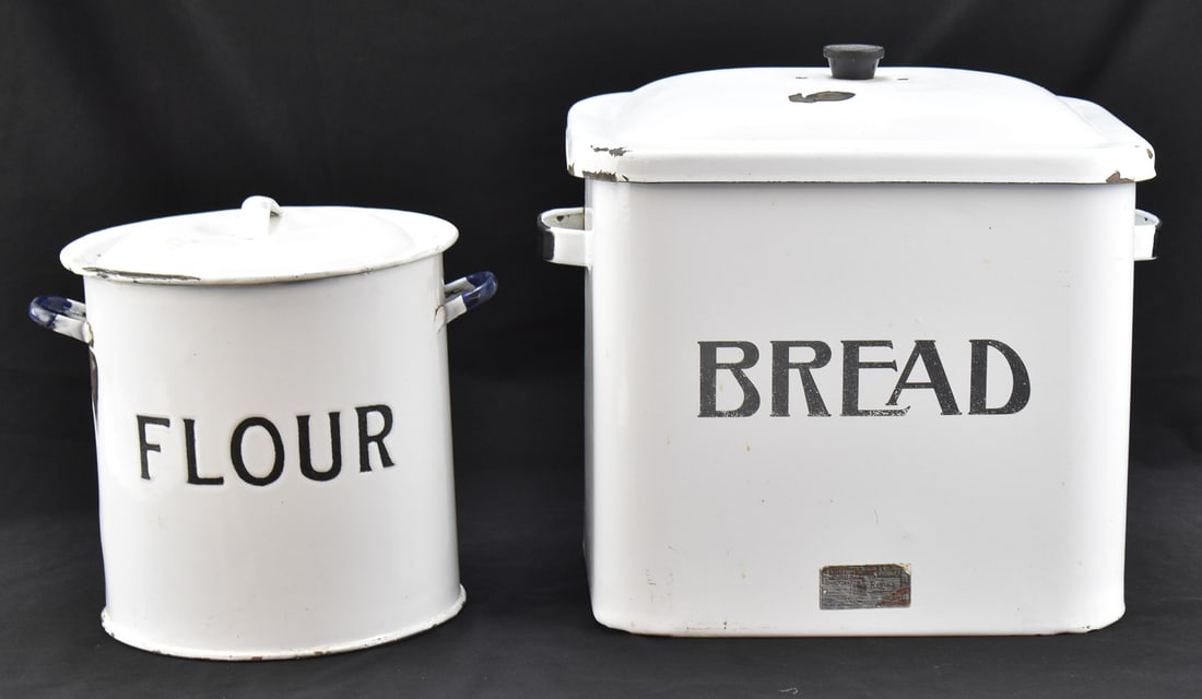 TWO BRITISH 'REGINA' (ATTR.) PORCELAIN ENAMEL CONTAINERS: BREAD AND FLOUR: This lot includes one British "Regina" porcelain enamel container and one attributed; for bread and flour, circa early-mid 20th century. The largest item measures 12.5" H, 13.5" W, 9.5" D.
