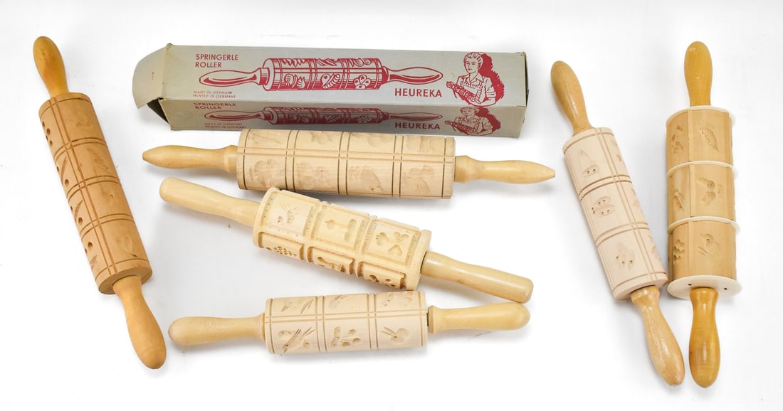 GERMAN SPRINGERLE ROLLING PINS ASSORTMENT: HEUREKA: This lot includes six rolling pins, circa late 20th century; five of which are marked "Germany" and one includes a Heureka brand springerle roller with an original box. The largest item measures 2.5"