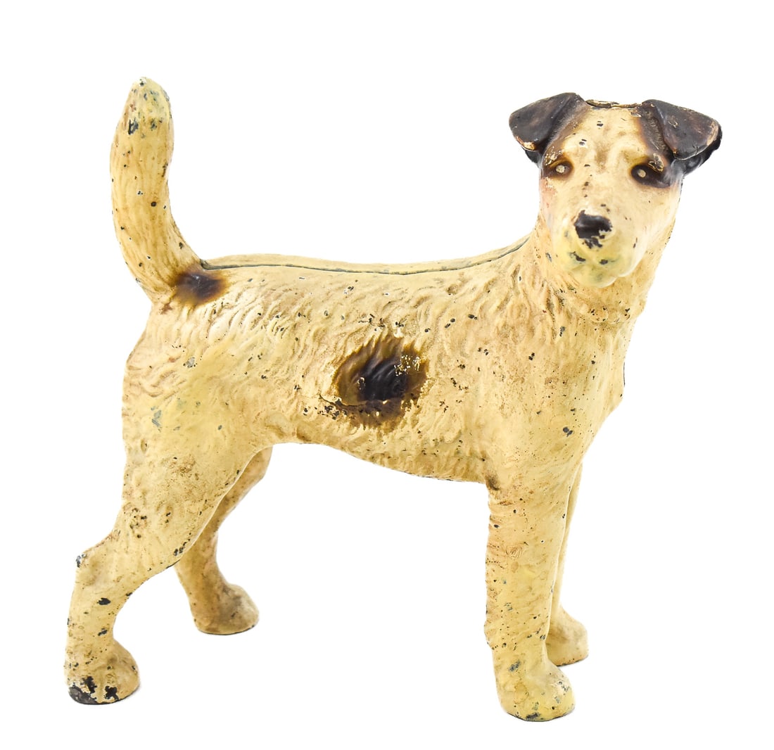 HUBLEY (ATTR.) WIRE-HAIRED FOX TERRIER No. 279 CAST IRON DOOR STOP: A Hubley (attributed) cast iron wire-haired fox terrier doorstop No. 279, circa 1940s. The item measures 8.5" H, 7" W, 4" D.