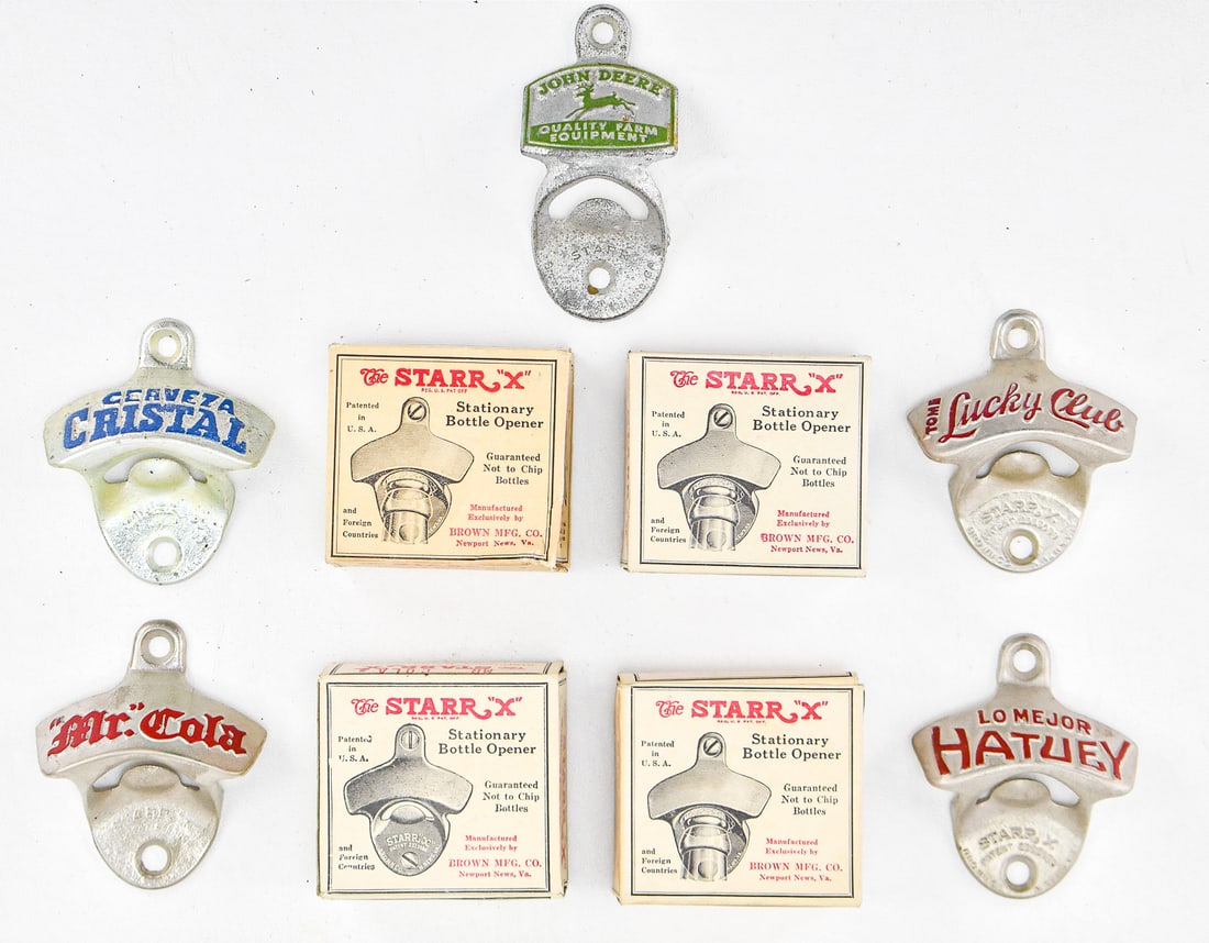 COLLECTION OF STARR-X ADVERTISING WALL-MOUNT BOTTLE OPENERS NEW OLD STOCK IN ORIGINAL BOXES: A collection of five vintage new-old-stock cast iron advertising wall-mount bottle openers which includes; Mr. Cola, Cesveza Cristal, Toms Lucky Club, Lo Mejor Hatuey, and John Deer measuring approx.
