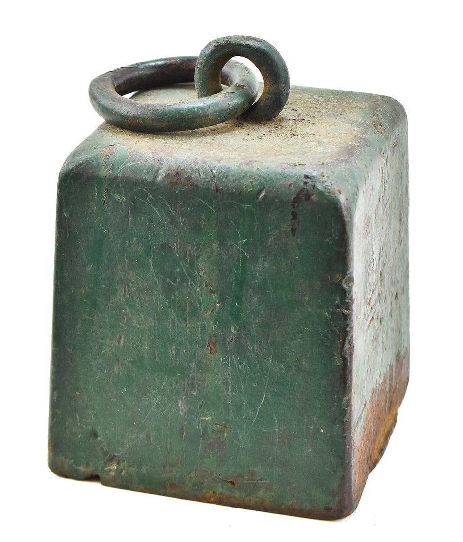 19TH CENTURY CARRIAGE WEIGHT OR HORSE TETHER: A 19th century cast iron carriage weight or horse tether, used to secure a horse and buggy when stopped. Made of heavy cast iron with a ring top for attaching a tether. The item measures 8" H x 5.5"