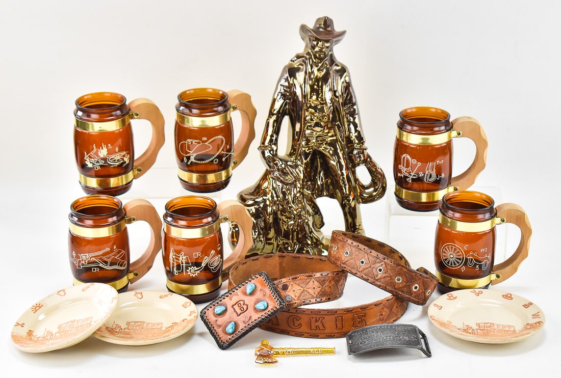 COLLECTION OF WESTERN THEMED HOUSEWARE & MORE: A collection of vintage western themed housewares and more which includes; a miniature marigold carnival glass tomahawk, three 1940s Wallace "Chuck Wagon" bread plates, one Well Fargo pewter belt