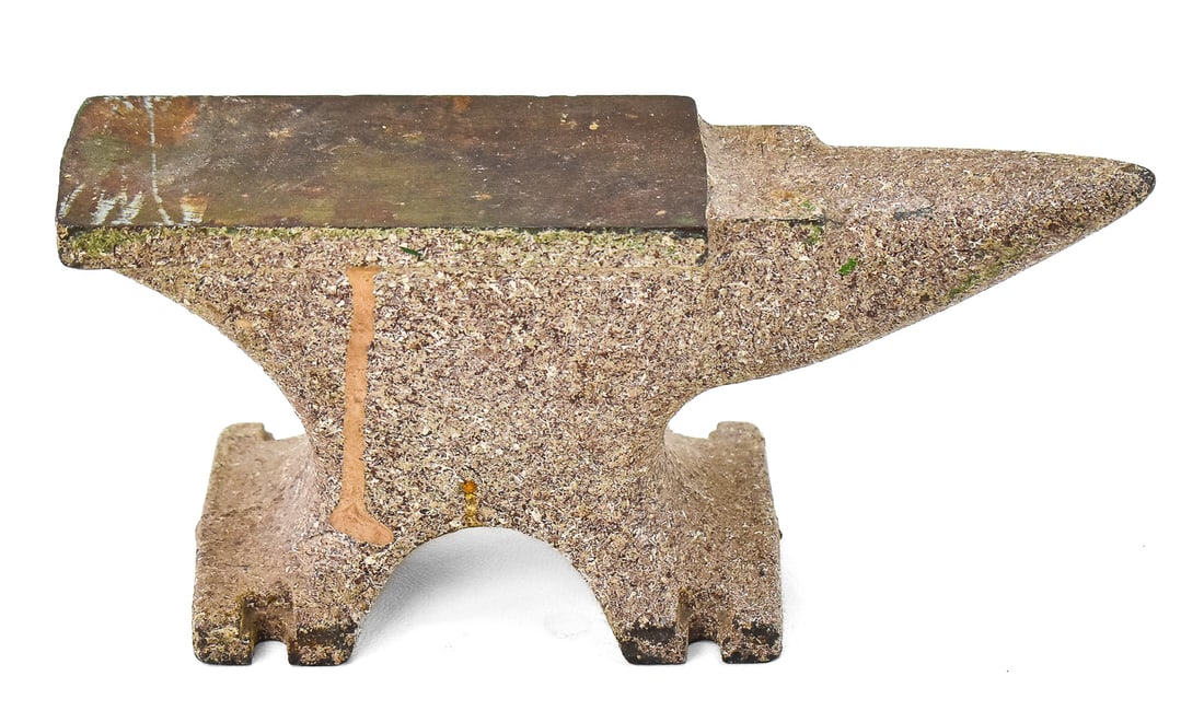 7.5 LB ANVIL: A 7.5 lb. anvil made of heavy cast iron. Often used by hobbyists or as decorative display. Measures 3.75" H x 8.5" W x 3" D.