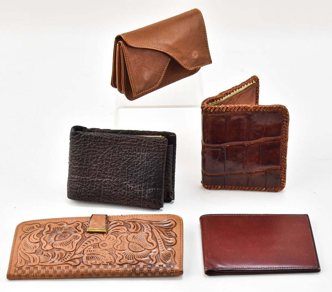 FIVE LEATHER WALLETS; MID-LATE 20TH CENTURY (1 of 3)