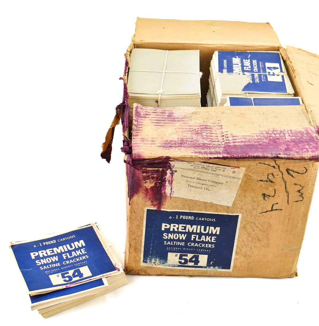 NEW OLD STOCK NATIONAL BISCUIT COMPANY 'PREMIUM SNOWFLAKE SALTINE CRACKERS' LABELS WITH SHIPPING BOX: National Biscuit Company new old stock "Premium Snowflake Saltine Crackers" No. 54 labels within an original shipping box, circa early-mid 20th century. The largest item measures 12" H, 15.5" W, 13"