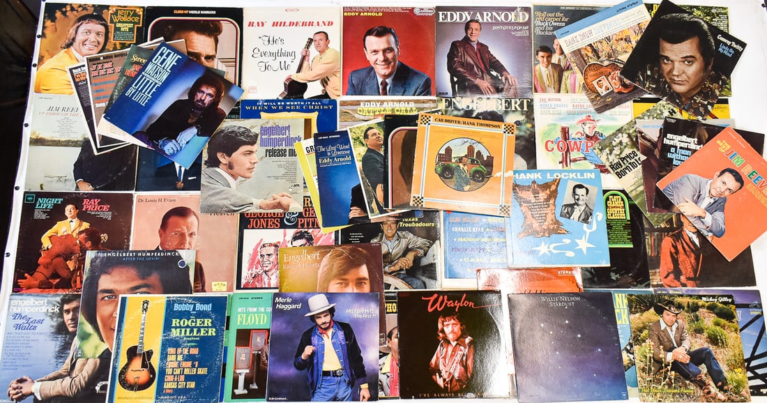 FIFTY-FOUR LP COLLECTION OLD-TIME COUNTRY & MORE: A box of fifty-four LP's of old-time country music and more which includes; Willie Nelson, Waylon Jennings, Hank Locklin, Roger Miller, Ernest Tubbs, George Jones and others. Records in sleeves measur