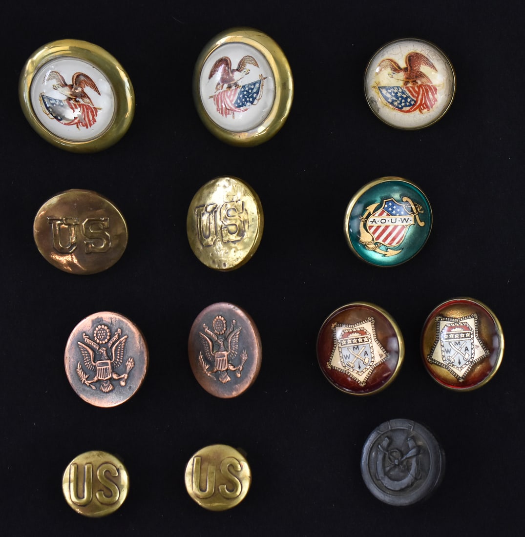 ANTIQUE HORSE BRIDLE ROSETTES WWI & OTHERS: Thirteen antique horse bridle rosettes, five pairs and three singles in brass, copper and other. Some dating back to the WWI U.S. Calvary. The largest set measures 2.25" H x 2.25" W x 1" D.