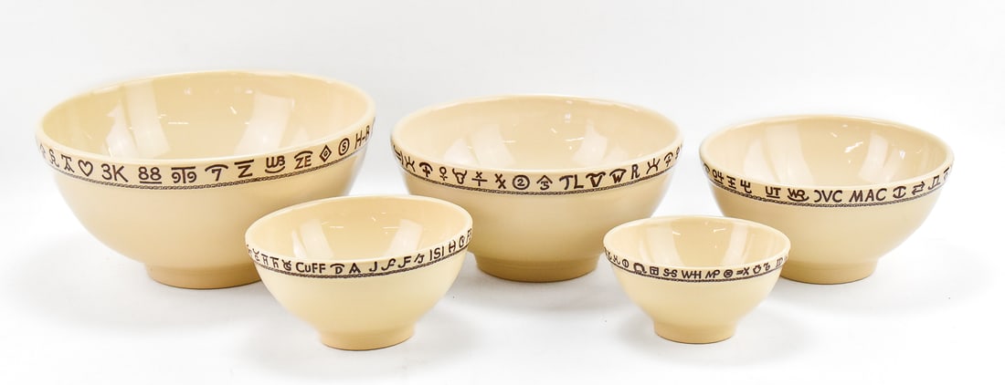 WALLACE CHINA WESTWARD HO 'RODEO' PATTERN FIVE-PIECE NESTING BOWL SET: A Wallace China Westward Ho "Rodeo" pattern five-piece nesting bowl set. The largest bowl measures 5.75" H x 12" W x 12" D.