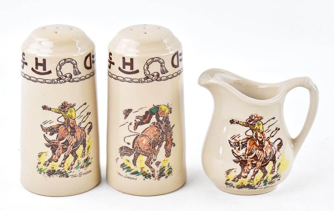 WALLACE CHINA WESTWARD HO 'RODEO' PATTERN SALT & PEPPER PLUS CREAMER PITCHER: Three pieces of Wallace China Westward Ho "Rodeo" pattern which includes a salt & pepper set, and a creamer pitcher. The shakers measure 5" H x 3.25" W x 3.25" D.
