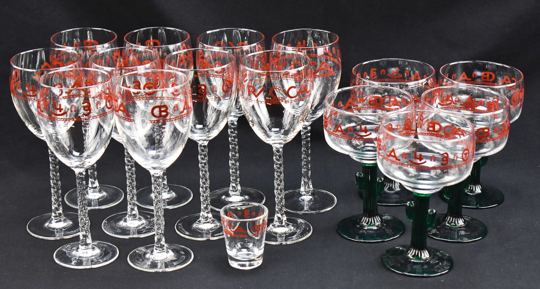 A COLLECTION OF WESTWARD HO 'RODEO' STYLE GLASSWARE: A collection of sixteen pieces of Westward Ho "Rodeo" style glassware which includes, one shot glass, five margarita glasses with cactus stems, and ten stemmed glasses which measure 8" H x 3" W x 3"