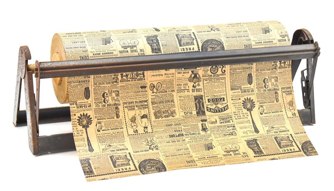 ANTIQUE MERCANTILE COUNTERTOP PAPER DISPENSER: Antique mercantile or general store heavy-duty countertop paper dispenser and cutter. Measurements with the paper roll are 9" H x 26" W x 6" D