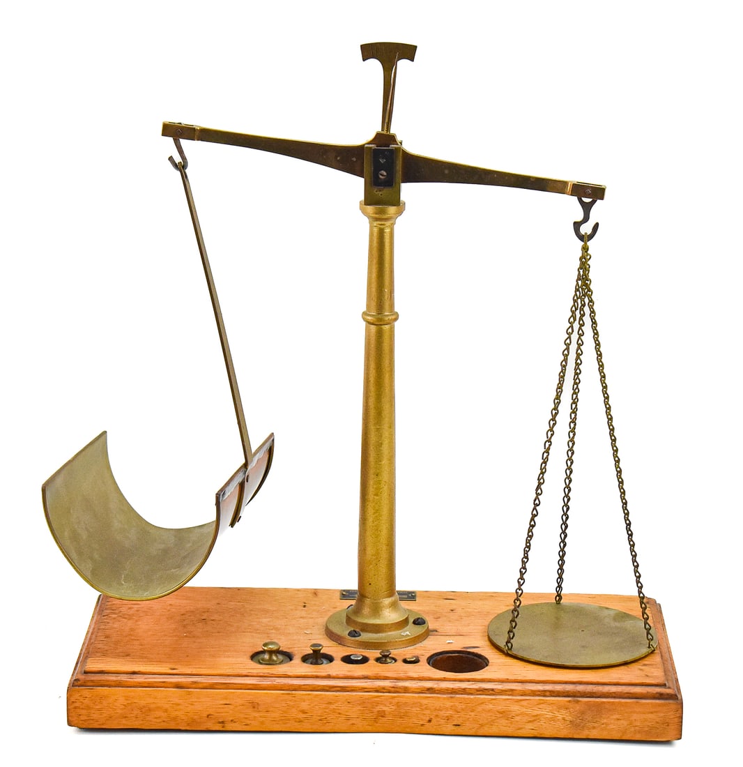 APOTHECARY SCALE MODEL 939, HENRY TROEMNER, LATE 19TH CENTURY: An apothecary scale model 939 made by Henry Troemner of Philadelphia, Pennsylvania, circa late 19th century. The scale has the original maker's tag and includes weights of varying sizes. The scale