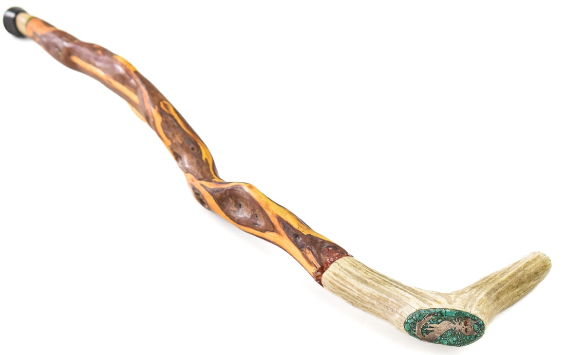HAND-CARVED DIAMOND WILLOW WALKING STICK WITH TURQUOISE & STERLING SILVER INLAY: A one-of-a-kind hand-carved Diamond Willow walking stick with a turquoise inlay around the bottom and turquoise and sterling silver inlay handle with a cat motif. The walking stick measures 38"H x 8"W