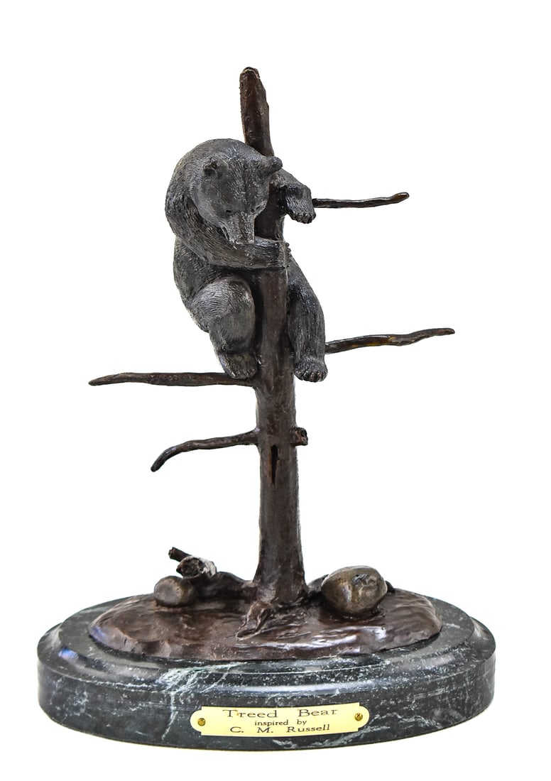TREED BEAR SCULPTURE INSPIRED BY C.M. RUSSELL: Treed Bear inspired by C.M. Russell is on the front plaque. Sculpture was made in 1997 and is number 92/750. The words "inspired by C.M. Russell" are etched into the back of the sculpture,