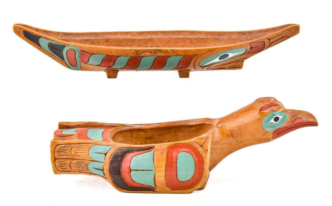 TWO CONTEMPORARY CANADIAN NORTHWEST COAST TRIBAL STYLE PEARLITE SOUVENIRS: POTLATCH BOWL AND CANOE: Two contemporary Canadian Northwest Coast tribal style Pearlite hand-painted souvenirs: potlatch bowl and canoe. The largest item measures 4.5" H, 14" W, 4.5" D.