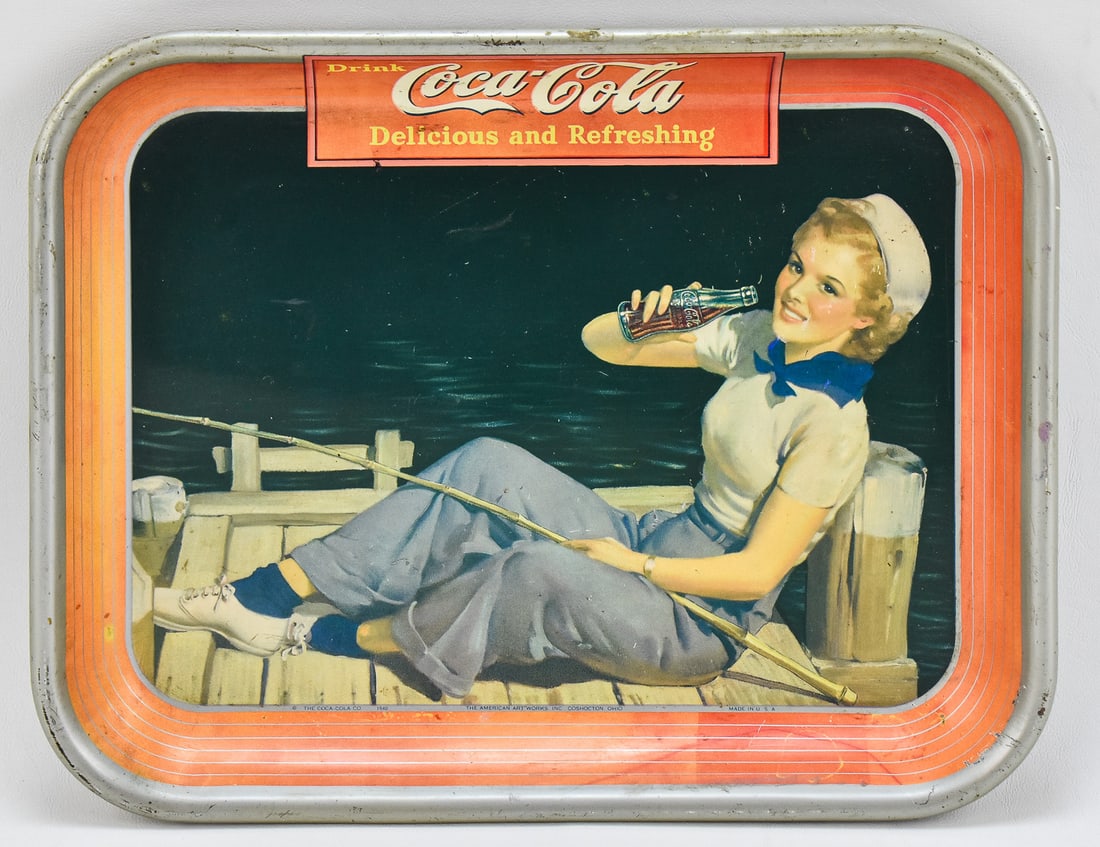 COCA-COLA DRINK TRAY, C. 1940.: A Coca-Cola drink tray made in 1940 by The American Art Works Inc. of Coshocton, Ohio. The date and maker information are printed on the lower portion of the border of the artwork. The tray measures 1
