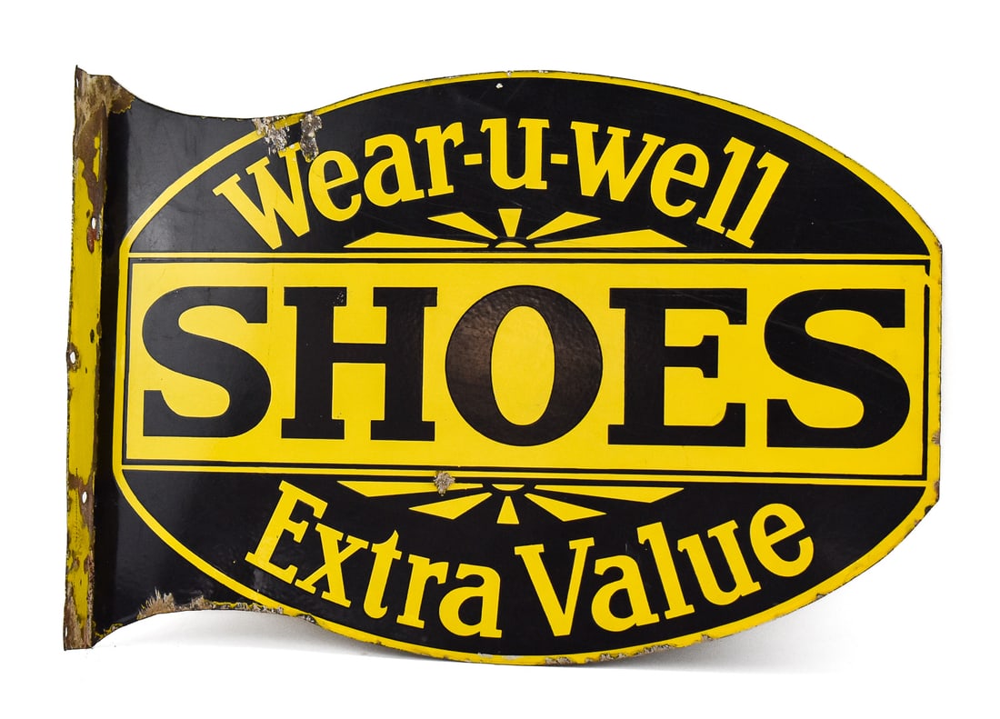 WEAR-U-WELL SHOES DOUBLE-SIDED PORCELAIN ENAMEL FLANGE SIGN; C. EARLY 20TH CENTURY: A Wear-U-Well Shoes double-sided porcelain enamel flange sign, circa 1920s-1930s. The item measures 17" H, 24.5" W, 2" D.