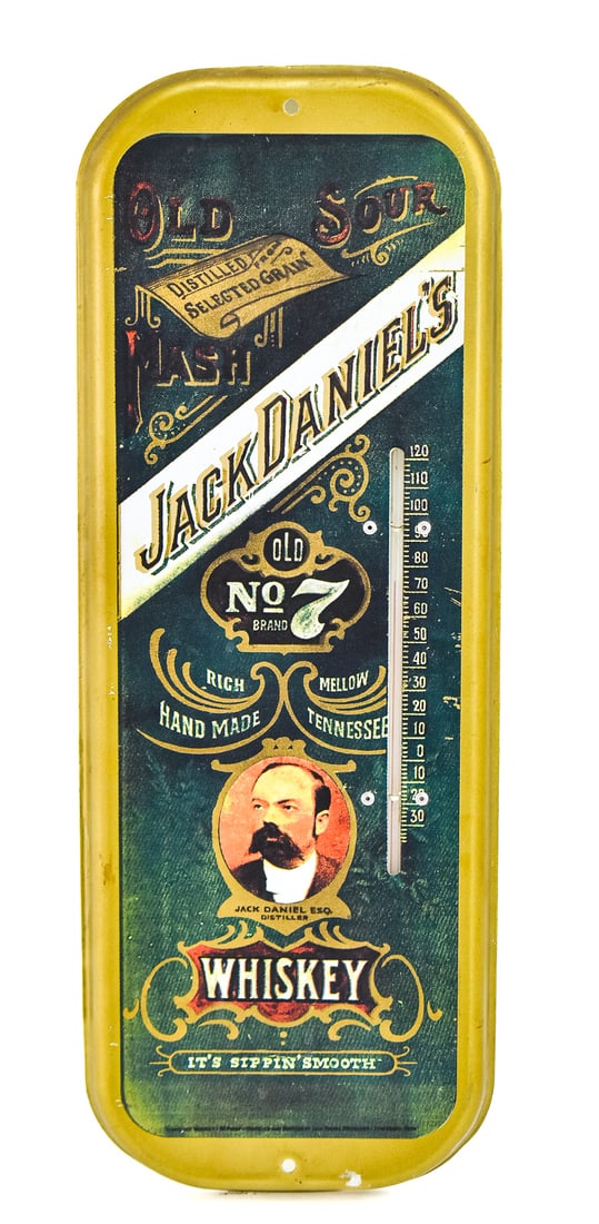 JACK DANIEL'S WHISKEY THERMOMETER: Thermometer displays classic Jack Daniel's branding with a portrait of Jack Daniels. Sign is made of tin and the thermometer is glass. Measurements are 16"H x 6" W x 0.25" D.