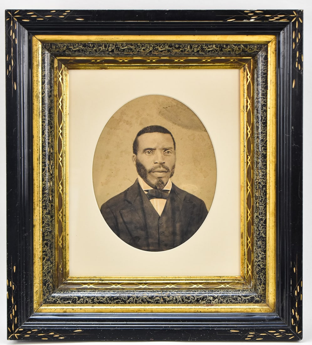 AFRICAN AMERICAN MAN'S PORTRAIT IN GOUACHE: Original African American man's portrait in gouache on paper measuring 9" H x 7" W presented in a period frame measuring 18" H x 16" W x 3" D.