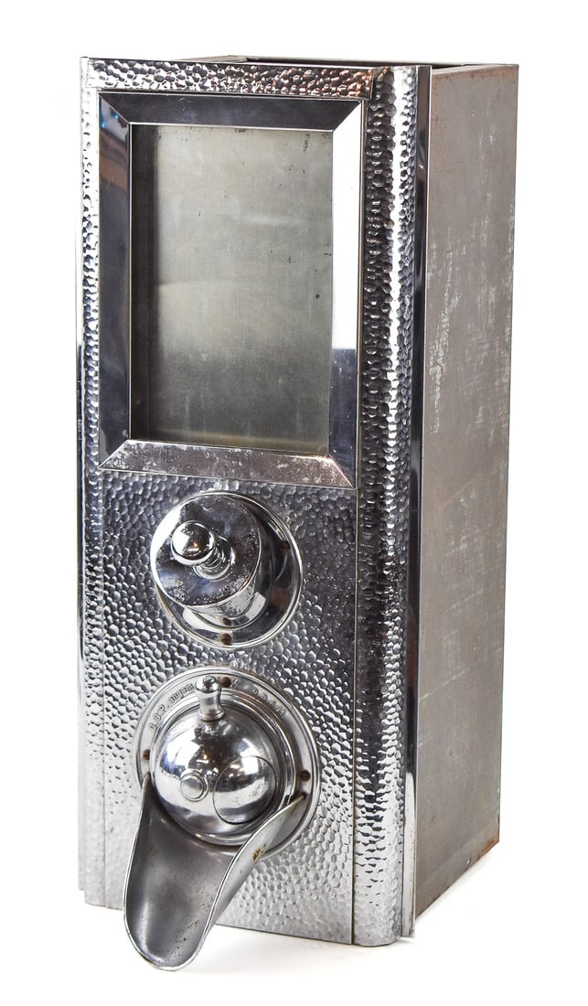 1940s INDUSTRIAL COFFEE BEAN DISPENSER: A circa 1940s industrial countertop or wall-mount coffee bean, candy or nut dispenser with a hammered stainless finish which measures 24" H x 10.5" W x 14" D.