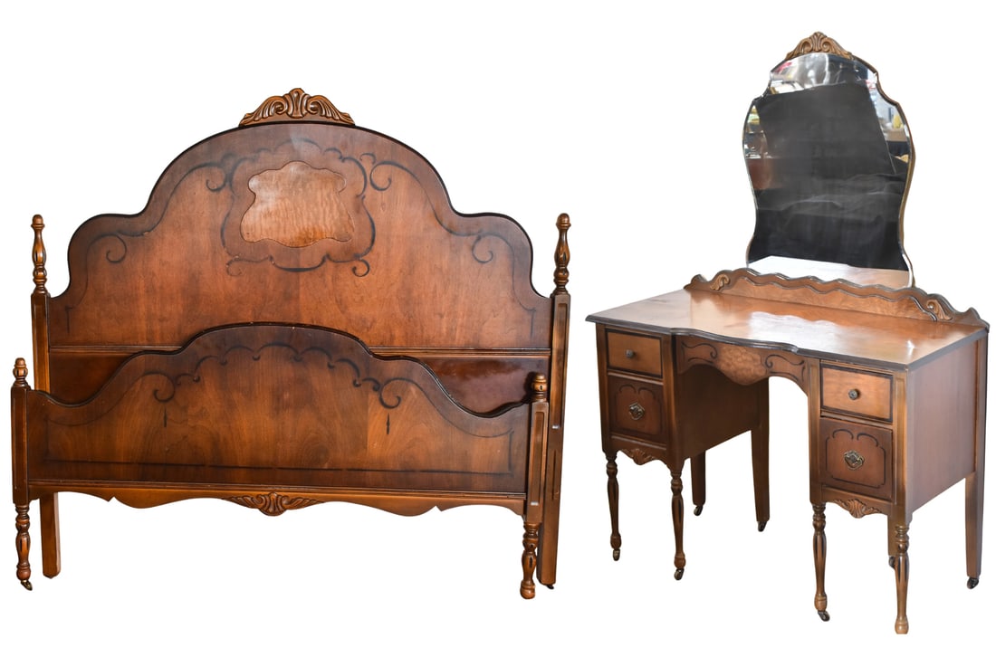 WALNUT BED FRAME & VANITY: Matching set of walnut bedroom furniture. Bed frame is queen in size and comes apart in four pieces. Vanity mirror can be unscrewed, however fully assembled it measures 63" H x 43.5" W x 19.25" D.