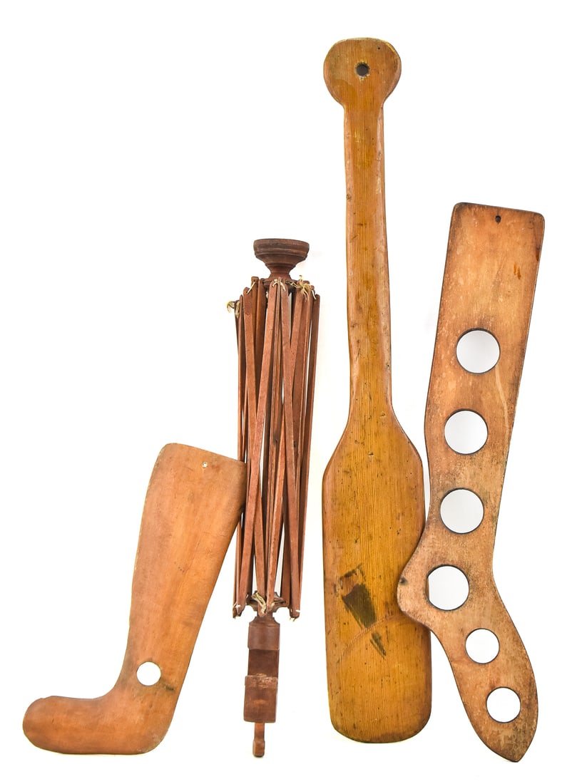 ASSORTMENT OF ANTIQUE LAUNDRY ITEMS: An assortment of antique laundry items including a umbrella-style wood mounted drying rack, a laundry paddle, and two wood pieces of boot forms. The laundry paddle measures 31.5" H x 4.5" W x 1" D.